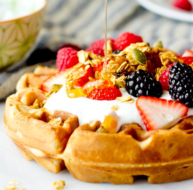 Healthy waffle recipe featuring high-fiber barley waffles topped with yogurt and berries